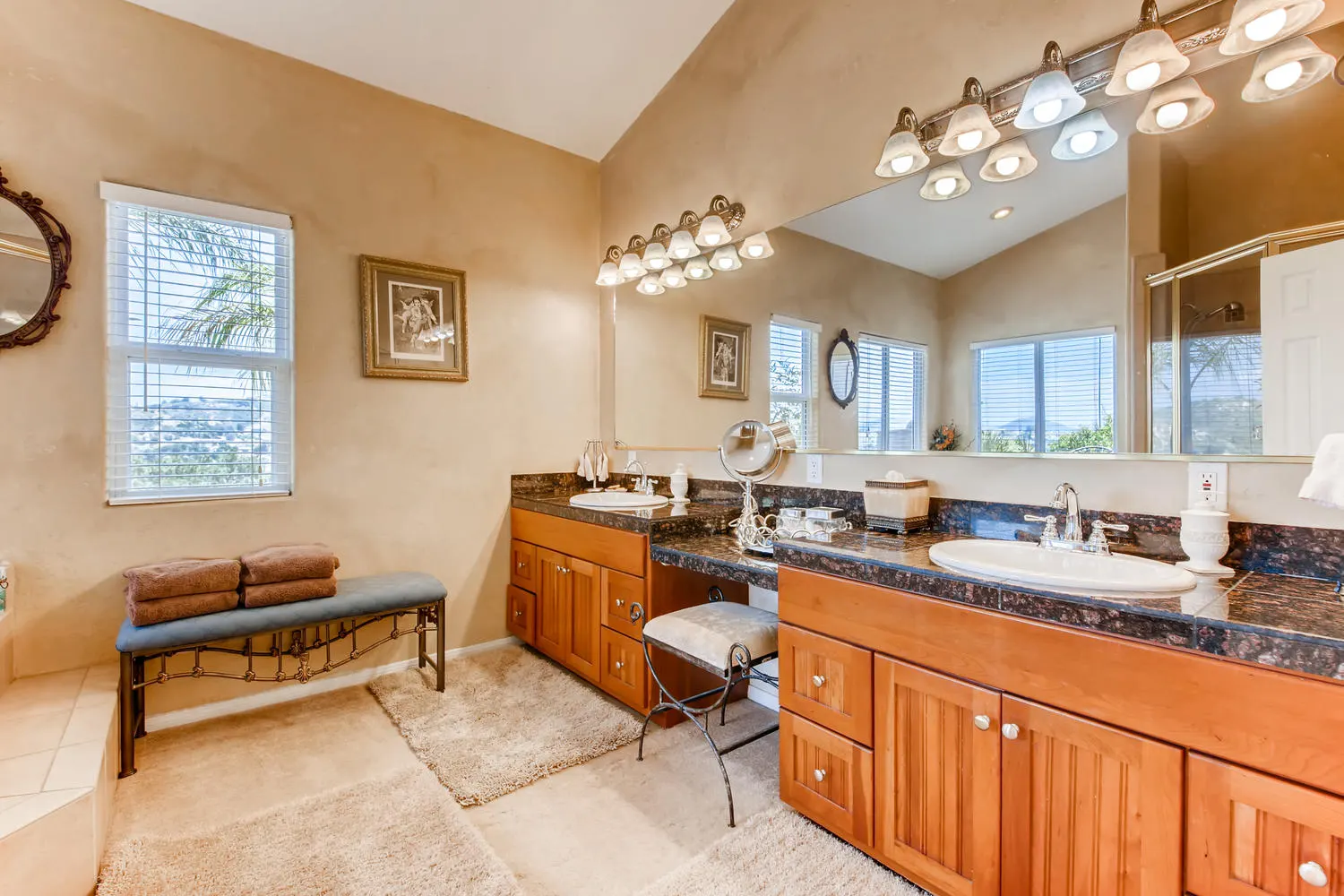 Dual granite vanities in the Executive Suite bath
