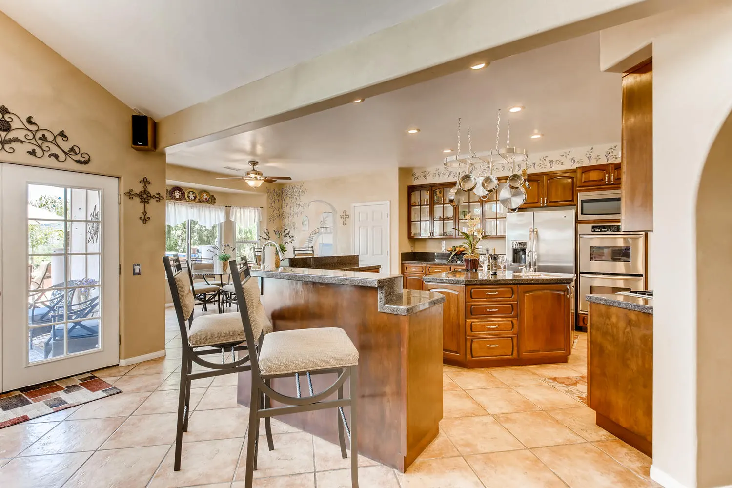 Granite counters and cabinetry in the kitchen
